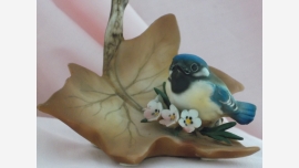 home-treasures.com Bisque Capodimonte Bird Figurine Capodimonte Bisque Bluebird Autumn Leaf Figurine